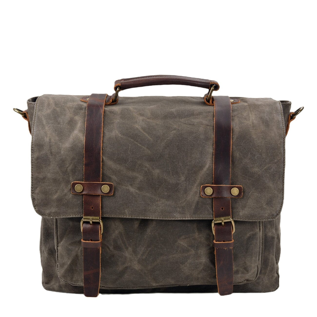 Canvas and leather clutch bag | BRUGES