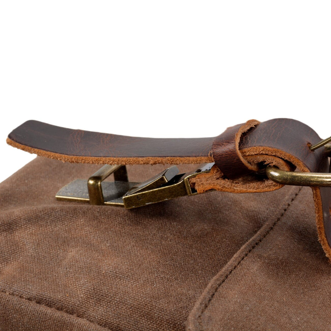 Canvas and leather clutch bag | BRUGES