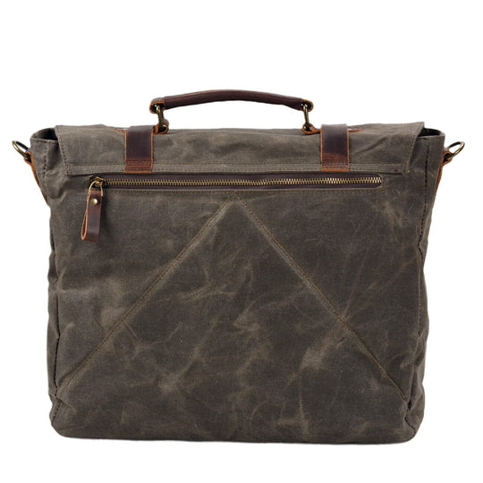 Canvas and leather clutch bag | BRUGES