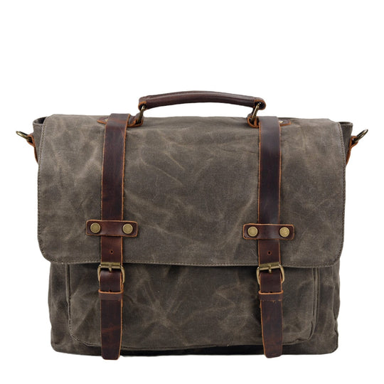 Canvas and leather clutch bag | BRUGES