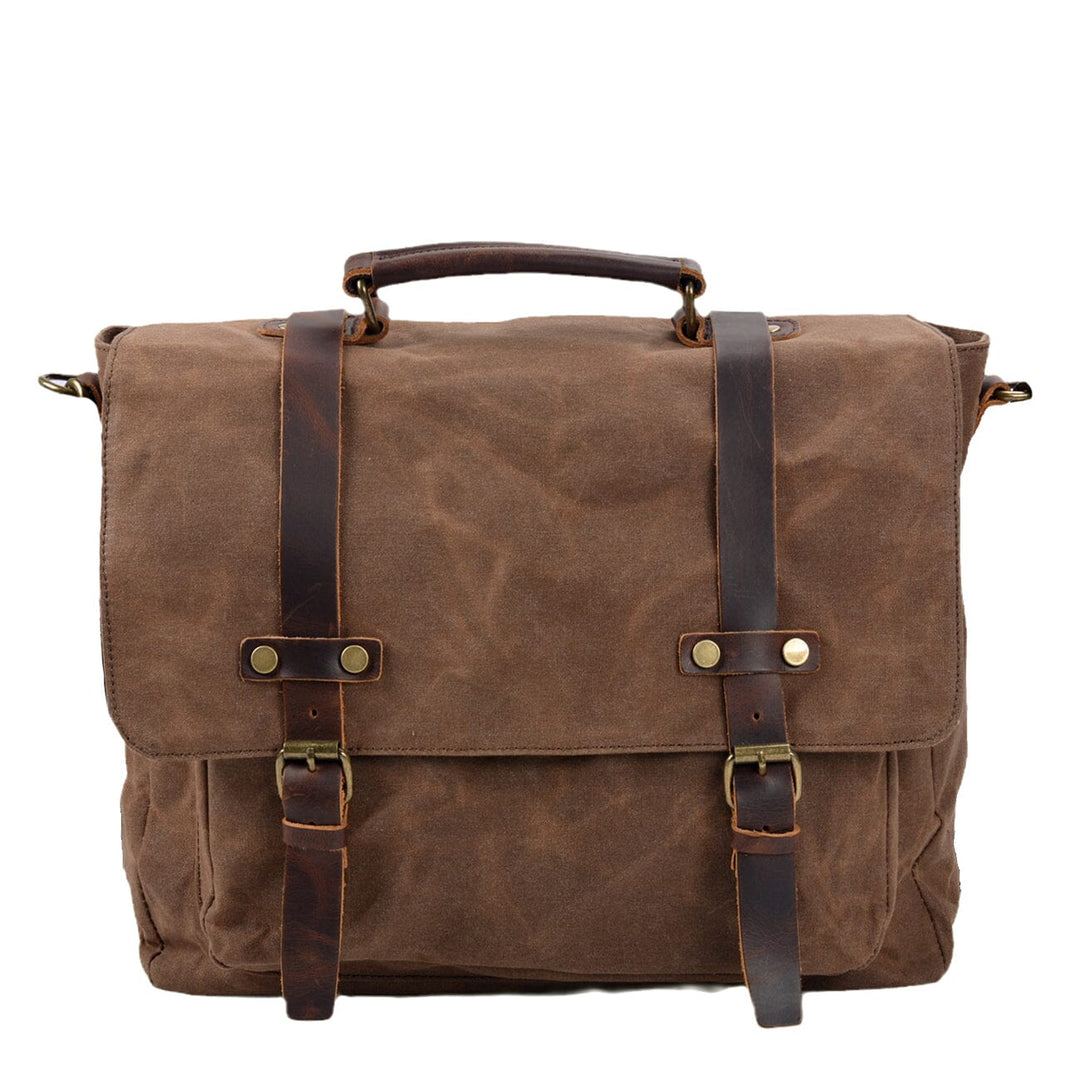 Canvas and leather clutch bag | BRUGES