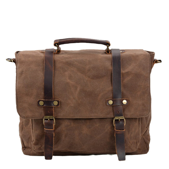 Canvas and leather clutch bag | BRUGES
