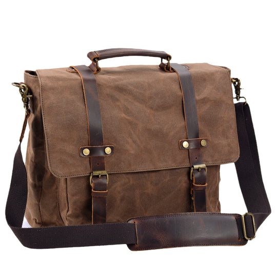 Canvas and leather clutch bag | BRUGES