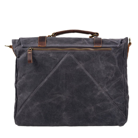 Canvas and leather clutch bag | BRUGES