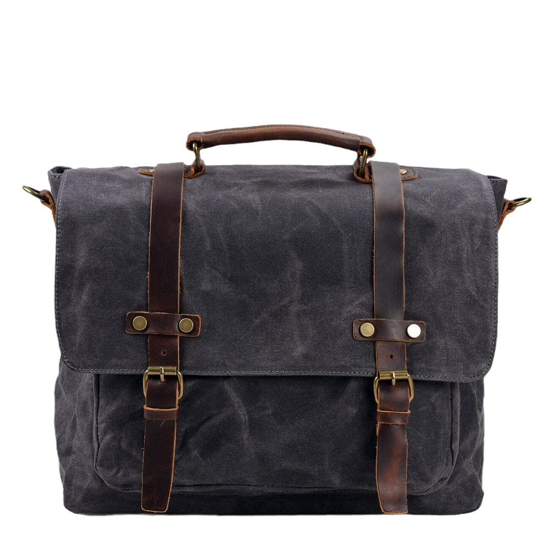Canvas and leather clutch bag | BRUGES