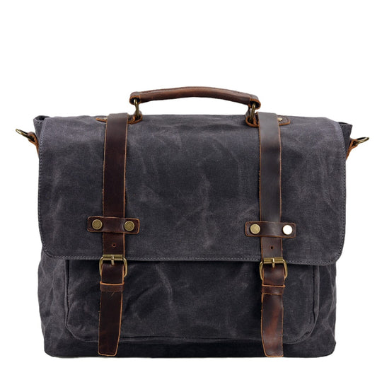 Canvas and leather clutch bag | BRUGES