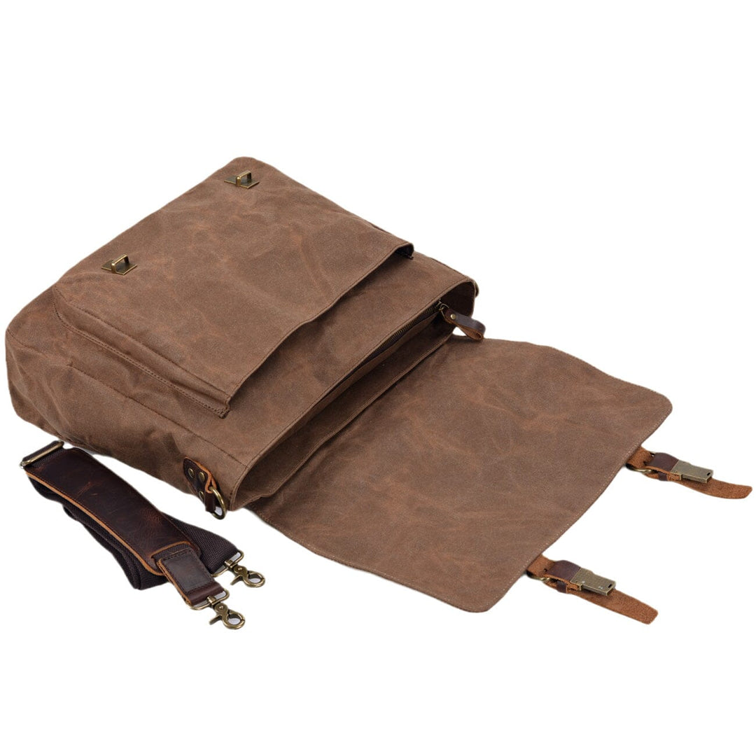 Canvas and leather clutch bag | BRUGES