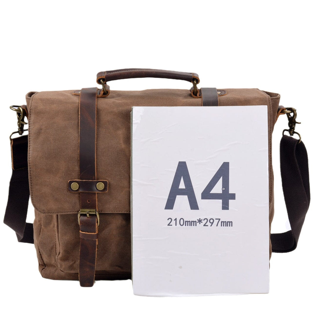 Canvas and leather clutch bag | BRUGES