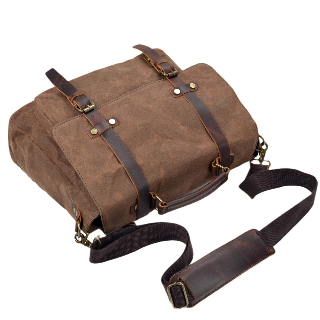 Canvas and leather clutch bag | BRUGES