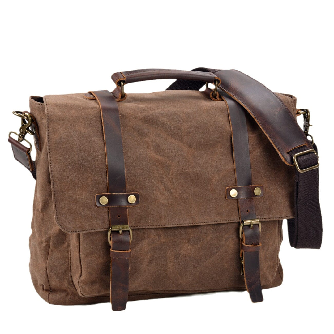 Canvas and leather clutch bag | BRUGES