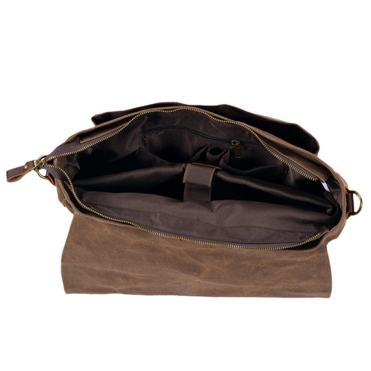 Canvas and leather clutch bag | BRUGES
